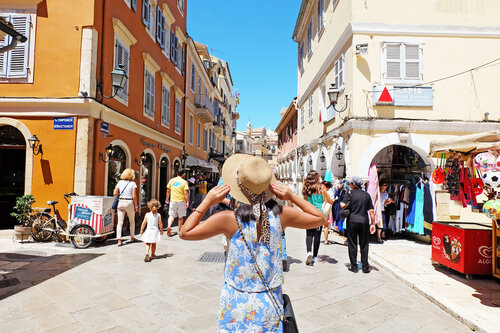 <div class="photoCaption">The perfect view and the perfect hat to guide me from the sun! Where are you headed to this summer? :) </div>