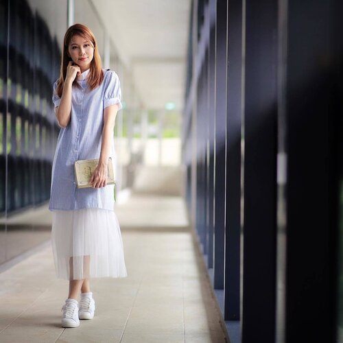 <div class="photoCaption">Going preppy chic with a touch of tulle c/o @joopboutique. Can you believe I'm actually wearing a tulle dress underneath? It can be layered with other tops/dresses too. Also loving my shorter and more manageable tresses thanks to @toliv.boutique!</div>